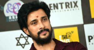 ಪ್ರೇಮ್‌ ಹೊಸ ಸಿನಿಮಾ | ಸಿಂಗಲ್‌ ಬ್ಯಾರಲ್‌ ಗನ್‌ ಹಿಡಿದು ಬಂದ ನಟ - Kannadamojo360